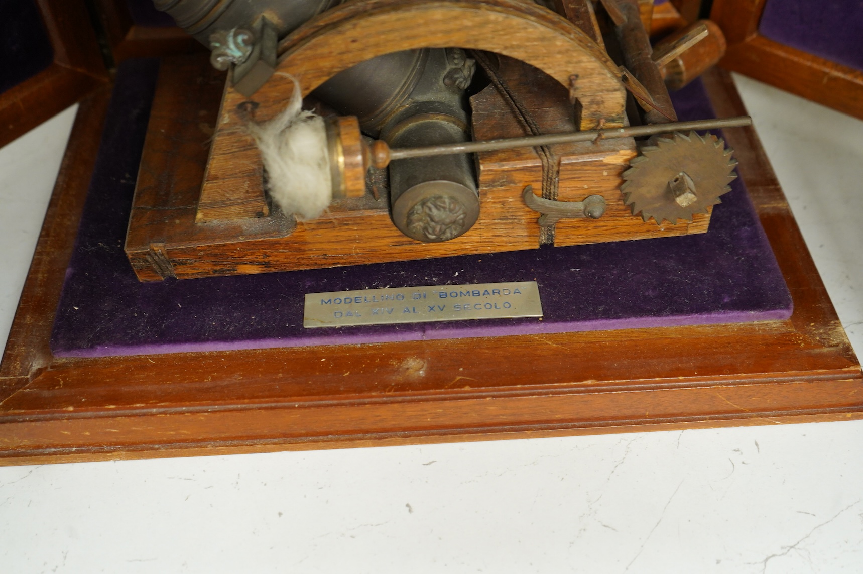 A teak cased presentation model of a bombarda mortar cannon in an oak frame, presented to Admiral Sir Michael Pollock from the Chief of Staff of the Italian Navy, with applied plaque to the lid engraved; ‘To Admiral Sir